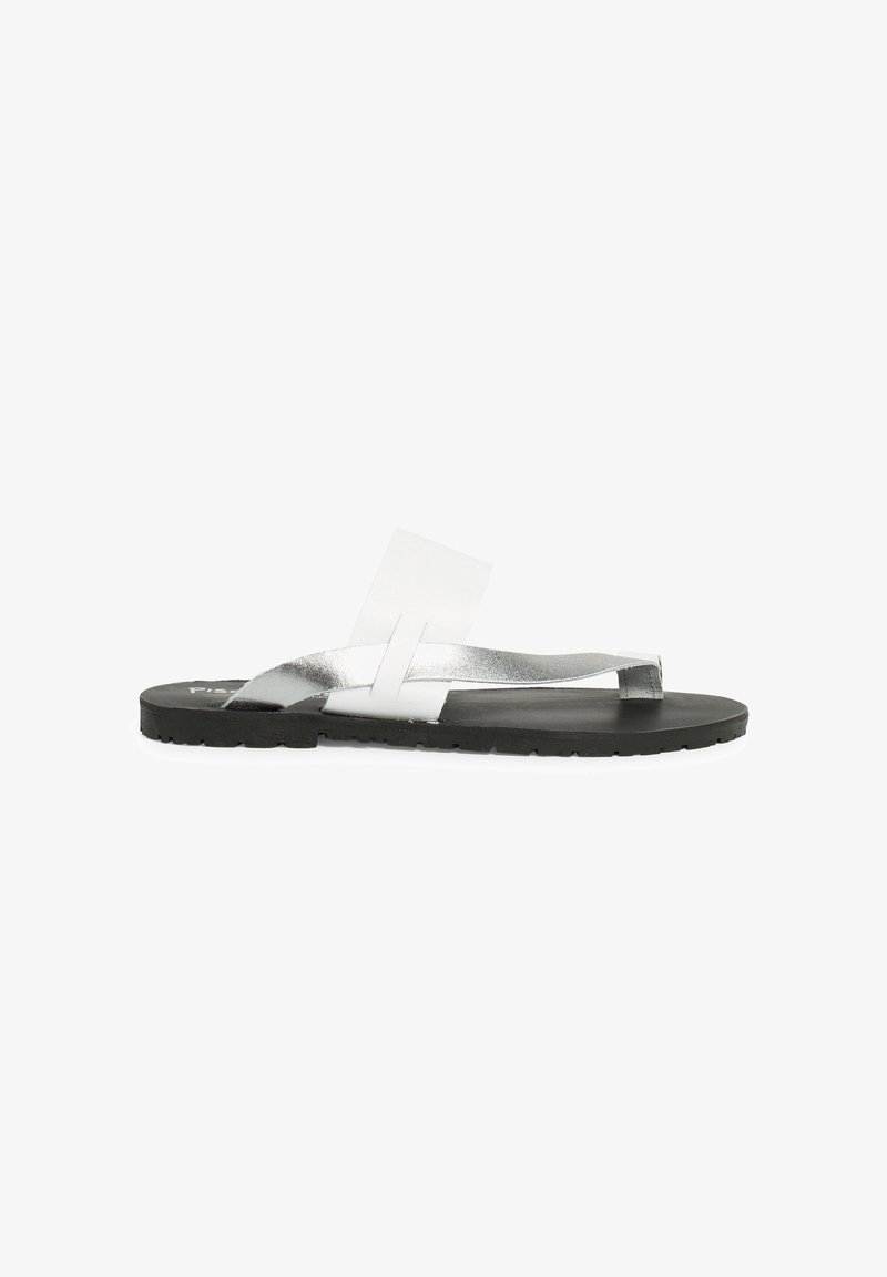 Silver flip-flop sandal with a flat black sole, featuring metallic straps and a transparent accent. Minimalist design and lightweight construction.