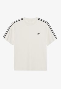 T-shirt à manches courtes, couleur crème, avec des rayures noires sur les épaules, col rond et petit logo noir sur la poitrine. Matière en coton douce.