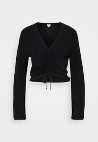 Schwarzes, kurzes Oberteil mit langen Ärmeln, V-Ausschnitt und Raffungsdetails auf der Vorderseite, mit verstellbaren Bändern am Saum für einen figurbetonten Look.