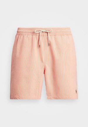 Pasiaste szorty kąpielowe w kolorze pomarańczowym i białym, z elastycznym pasem, zaciąganym sznurkiem i detalem logo z boku. Lekki materiał.