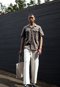 Weekday GALAXY LOOSE STRAIGHT UNISEX - Calças de ganga folgadas - white