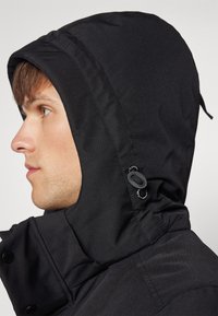 Icepeak ALAMOS  - Winter coat - black