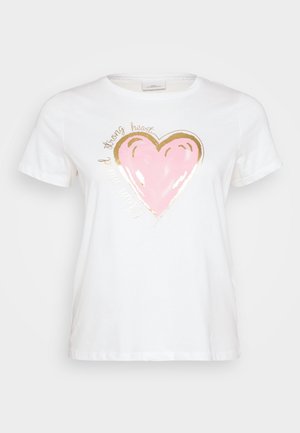Tricou alb din bumbac, cu guler rotund. Prezintă un grafic mare în formă de inimă roz, conturat în aur, cu textul "minte puternică" deasupra și "inimă puternică" dedesubt.