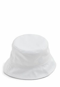 White cotton bucket hat with a rounded crown, wide brim, and stitched detailing along the base. Smooth texture and simple design.