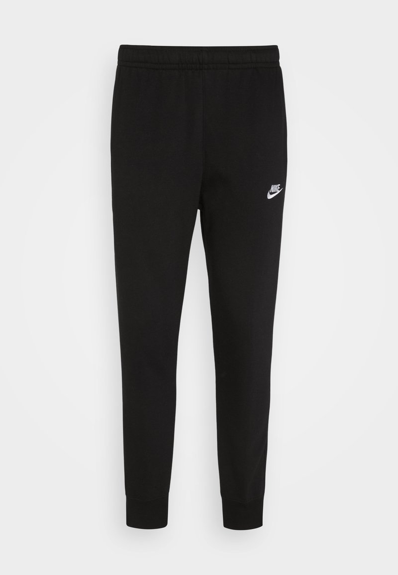 Pantalones deportivos negros hechos de una tela suave, con una cintura elástica y puños ajustados, con un pequeño logo blanco de Nike en el muslo izquierdo.