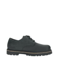 Scarpe stringate in pelle nera con finitura liscia, suola in gomma e intersuola in sughero marrone chiaro; presenta un marchio discreto sul lato.