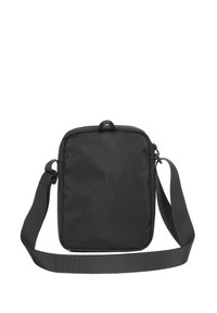 Borsa a tracolla nera realizzata in tessuto resistente. Presenta una maniglia superiore, una tracolla regolabile e una superficie testurizzata con hardware minimale.