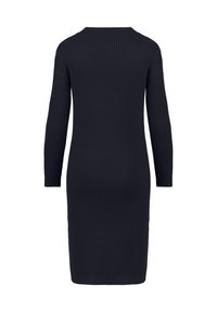 Abito a coste di un blu navy scuro con maniche lunghe, scollatura rotonda e silhouette aderente, che arriva a metà polpaccio. Senza fantasie né decorazioni.