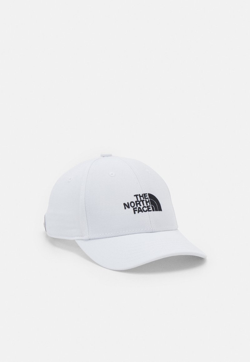 Balta beisbolo kepurė su juodu siuvinėjimu, kuriame pavaizduotas "THE NORTH FACE" logotipas. Minkšta medžiaga, kreivu vizoriumi ir reguliuojamu dirželiu gale.