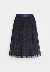 Jupe plissée marine avec une taille en satin, ornée de motifs en points argentés sur l'ensemble et d'une texture légère et fluide.