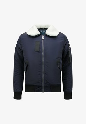 Marineblauwe bomberjack met een witte schapenvachtkraag, ritssluiting, steekzakken en geribbelde manchetten voor een nauwsluitende pasvorm.