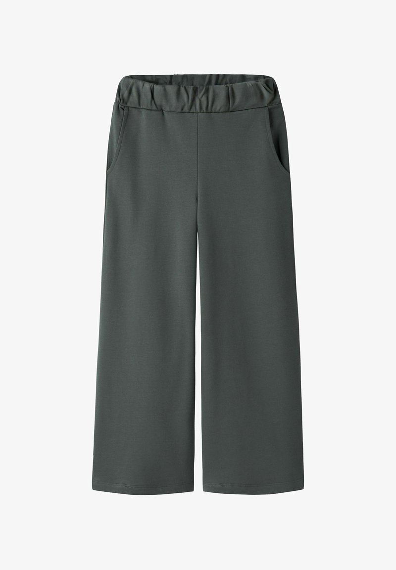 Pantalon large gris foncé avec taille élastique et poches latérales, présenté sur un fond blanc.