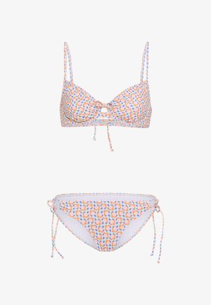 Pastelset värviline bikiinikomplekt ümmarguse mustriga. Omab reguleeritavaid rihmasid ja külgedel seotavaid paelu alumise osa kohandamiseks.