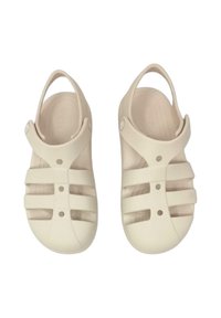 Beige rubber clogs with open heel, cut-out sides, and four horizontal straps. Features a slight sheen and textured footbed.