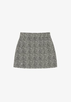 Houndstooth-gestreepte rok in zwart en wit. Heeft een aansluitende taille en een uitlopende silhouet. Gemaakt van een textuurstof.