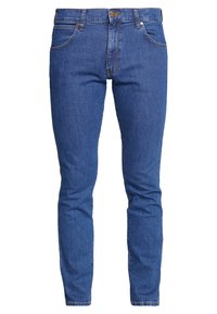 Slim-fit blå denimjeans med en mjuk yta, fem fickor och kontrasterande sömmar. Utrustad med metallknapp och dragkedjestängning.