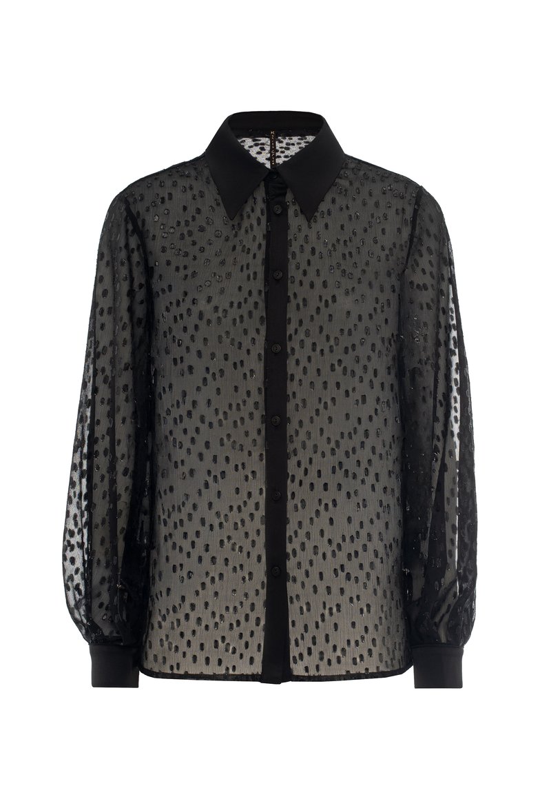 Black sheer blouse with polka dot pattern, button front, and structured collar; features elasticized cuffs and solid black accents.