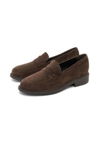 Brown suede loafers with a rounded toe, flat rubber sole, and decorative stitched accent on the upper. Classic slip-on design.
