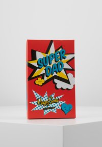 Red box featuring comic-style graphics, "SUPER DAD" in blue, black and yellow stars, and "Happy Socks" logo with polka dots. Size range 41-46.