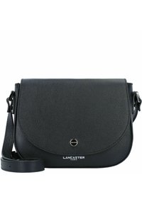 Black leather crossbody bag with a textured finish, rounded flap, and a silver logo accent. Features an adjustable strap for convenience.