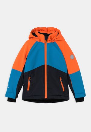 Children’s hooded jacket with orange, blue, and black color blocks, front zipper, zippered pockets, and a small reflective patch on the left sleeve.