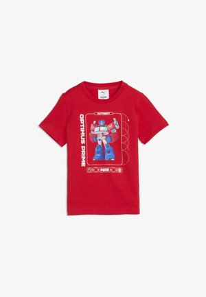 Czerwona dziecięca koszulka z krótkim rękawem z niebiesko-czerwionym motywem Optimus Prime oraz tekstem "AUTOBOT" i "OPTIMUS PRIME".
