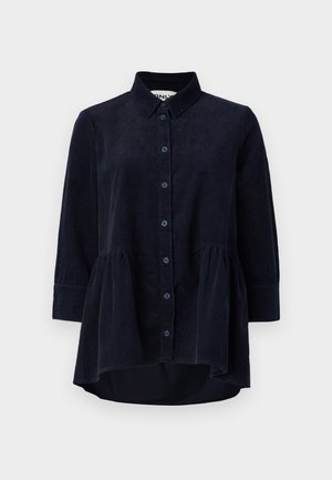 Marineblauwe corduroy blouse met een knoopsluiting aan de voorkant, kraag en driekwartmouwen. Bevat een peplum-stijl gerimpelde zoom en een zachte textuur.