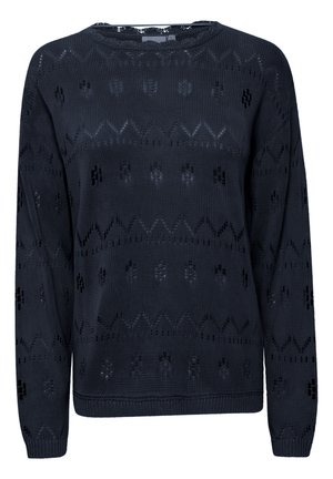 Jūras spēku zila adīta džemperis ar ģeometriskām un ziedu izgriezumu rakstiem, apaļu kakla izgriezumu un ribotām piedurknēm un apakšmalu. Mīksta tekstūra ar vieglu dizainu.