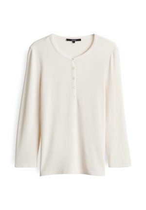 Chemise Henley à manches longues côtelée de couleur crème avec cinq boutons et un col rond, présentée sur un fond blanc.