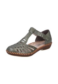 Sandalia de cuero verde con diseño calado, correa ajustable y suela marrón cosida. Presenta una punta redondeada y un interior acolchado.