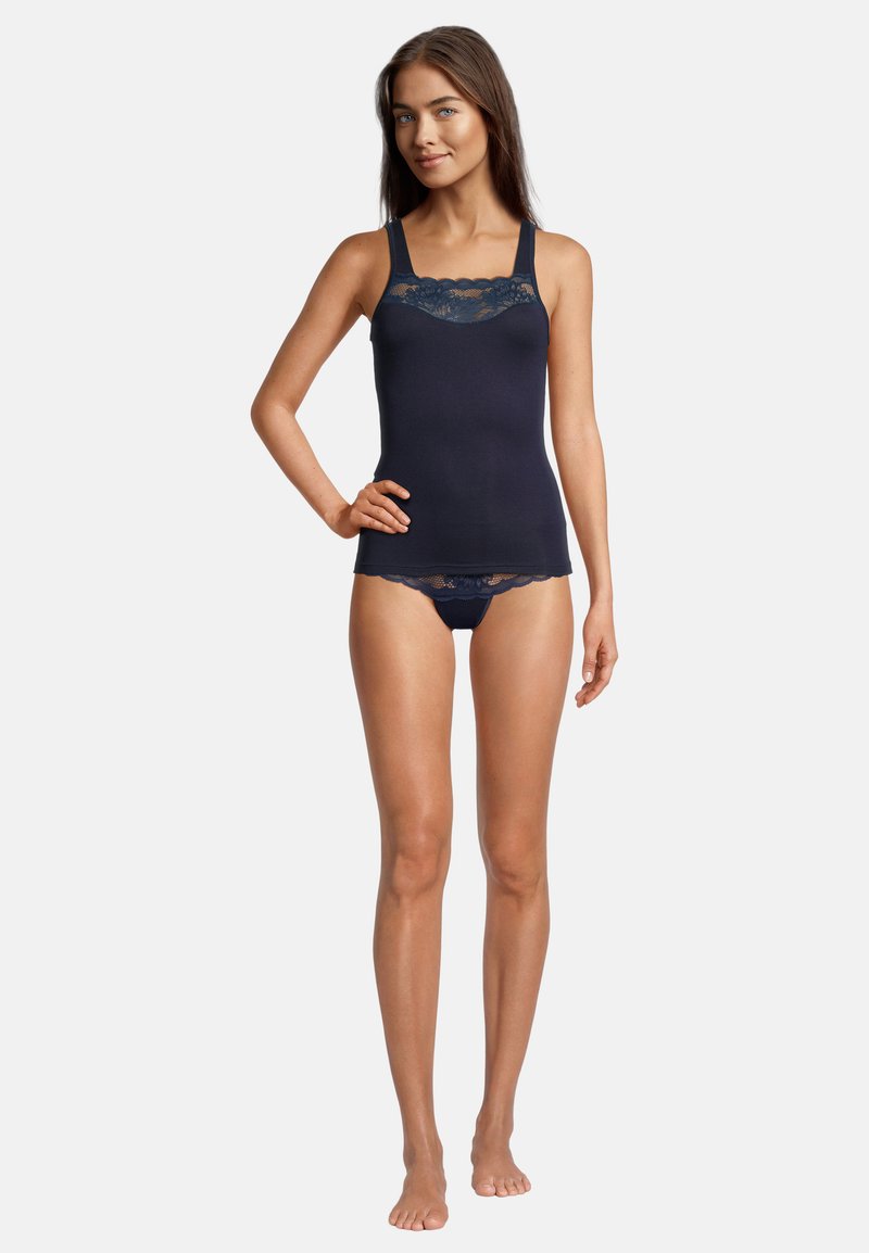 Navy tank top with lace trim along neckline, paired with matching lace-trimmed bottoms. Smooth fabric, fitted design, adjustable straps.