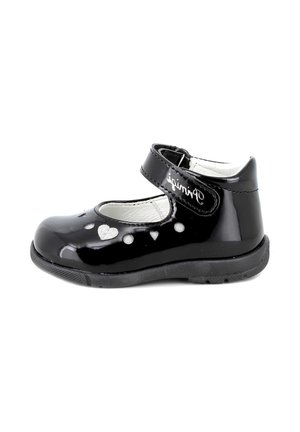 Scarpa Mary Jane per bambino in vernice nera con cinturino regolabile, dettagli a forma di cuore e punti argentati, e suola in gomma nera.