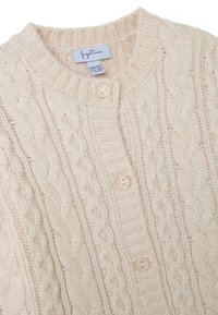 Strickjacke aus Kabelstrick in sanftem Beige. Mit rundem Ausschnitt, Knopfleiste und gerippten Bündchen. Hergestellt aus strukturierter Stoff mit einem gemütlichen Aussehen.