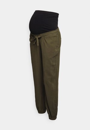 Joggers de maternidad con panel de estiramiento negro y tejido verde oliva. Corte holgado con cintura ajustable con cordón y puños elásticos.