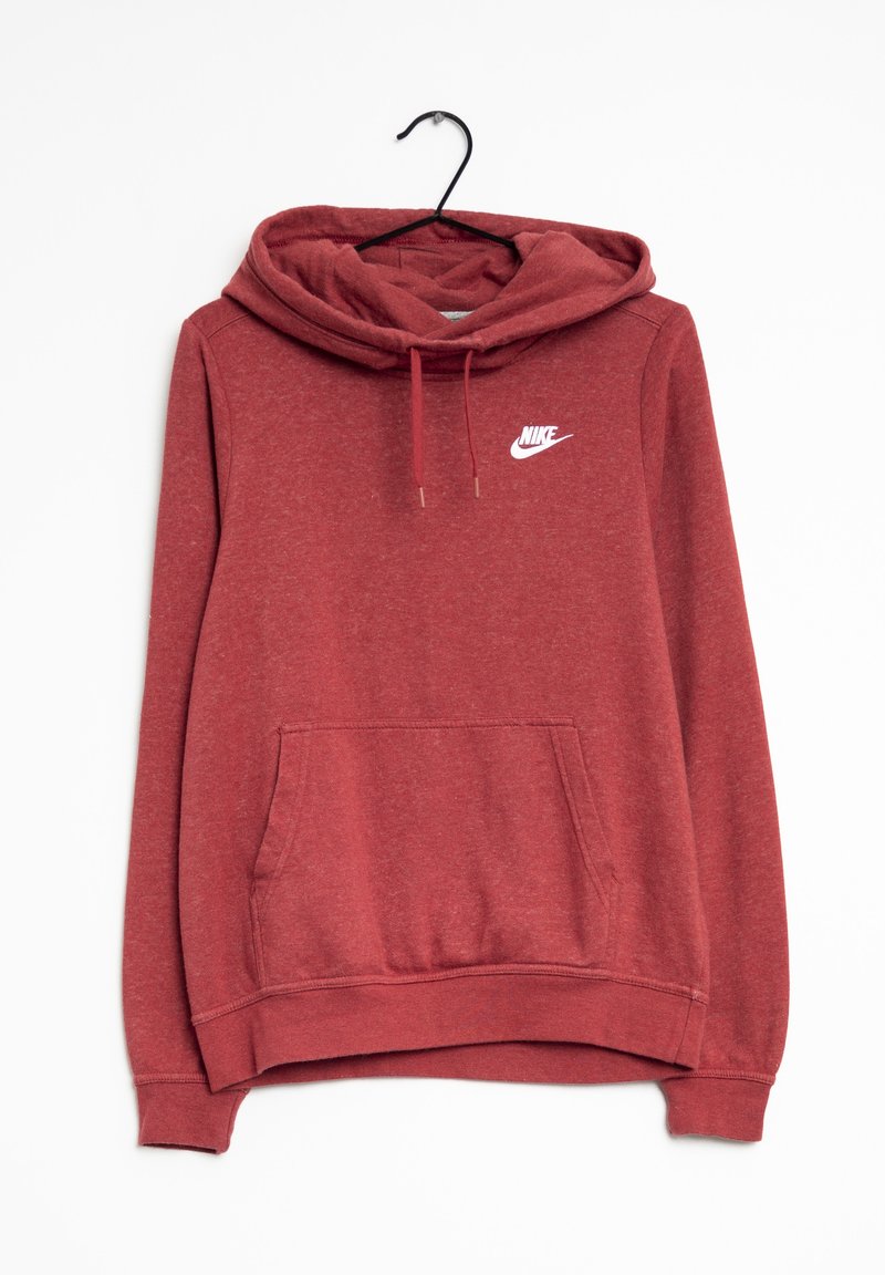 Sweat à capuche rouge Nike avec poche avant et capuche à cordon, suspendu à un cintre noir sur fond blanc.