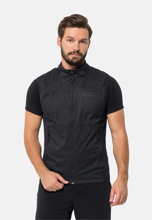Zwarte vest met een ritsluiting, gemaakt van lichte, gestructureerde stof. Voorzien van twee frontzakken en een hoge kraag. Logo op de borst.