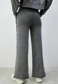 Next Treningo apatinė dalis - grey charcoal