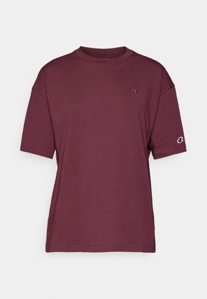 Burgundské tričko s krátkym rukávom vyrobené z jemnej bavlny, s okrúhlym výstrihom a logom umiestneným na ľavej hrudi a rukáve.