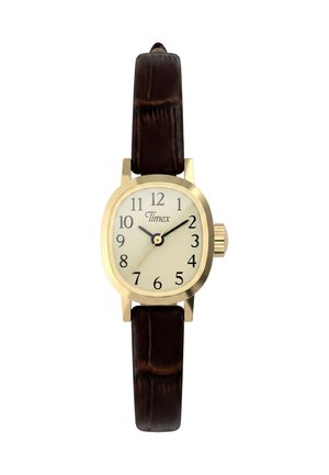 Χρυσό ρολόι χειρός Timex με κρεμ καντράν, μαύρους αριθμούς και σκούρο καφέ δερμάτινο λουράκι που δείχνει την ώρα 10:09:34.