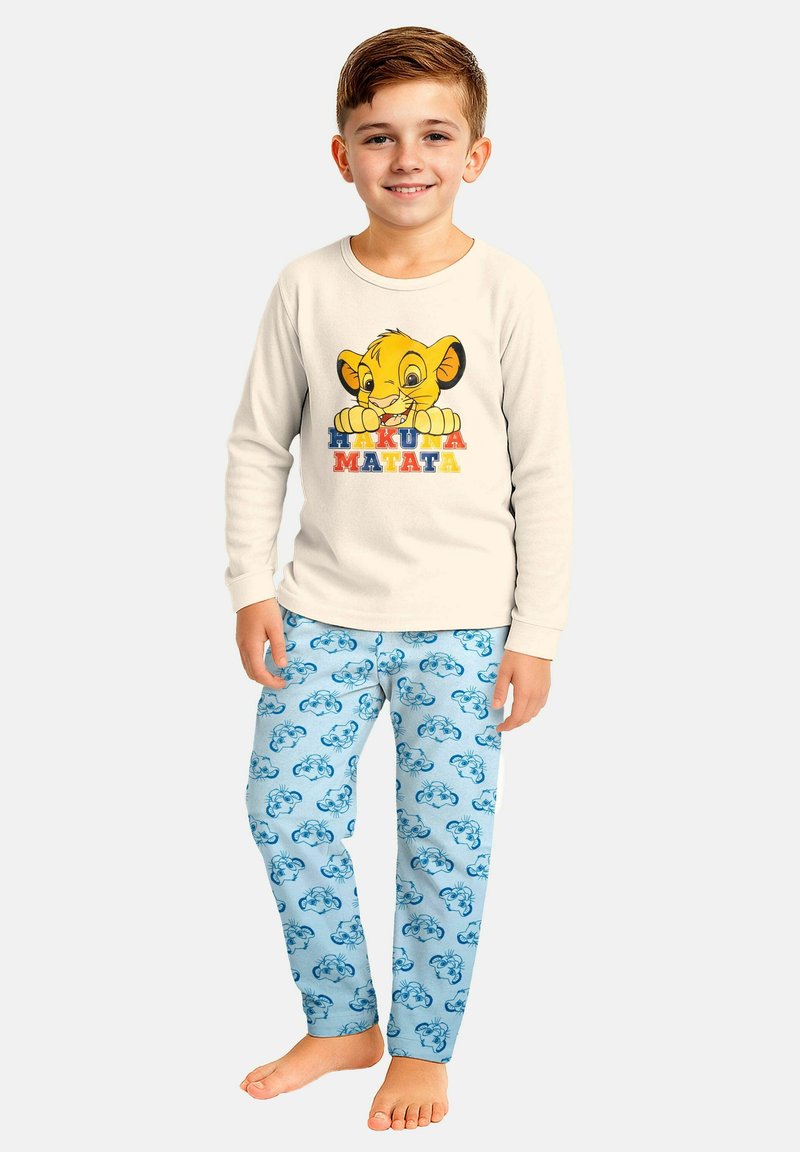 Camicia a maniche lunghe di colore crema chiaro con grafica di Simba e testo "HAKUNA MATATA", abbinata a pantaloni da pigiama blu con motivi di nuvole.