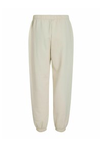 Pantalones de chándal de un beige claro con cintura elástica y puños elásticos. Fabricados con una tela suave, presentan una textura lisa y un corte relajado.