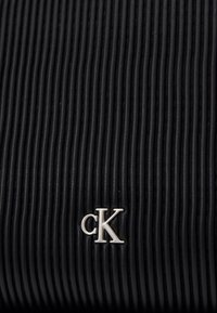 Calvin Klein Jeans SHOULDERBAG - Borsa a mano - black