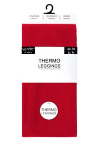Leggings thermiques rouges emballés avec une étiquette blanche. La taille indiquée est S/M (36-38). Le matériau est lisse avec une couleur unie.