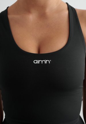 CORE ESSENTIAL - Medium support sports bra - black