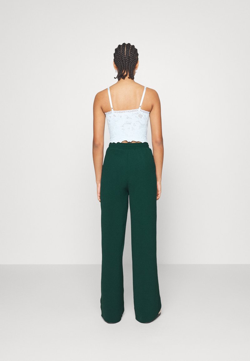 Loose fit broek met print voor dames in Bruin|Wit - BONNY