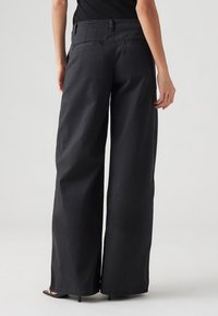 Levi's® XL CHINO - Laisvo kirpimo džinsai - caviar