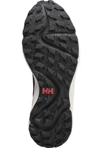 Podešev boty s černou gumovou základnou, která má texturovaný vzor běhounu a červené logo. Strana je bílá s zakřivenými designovými prvky.