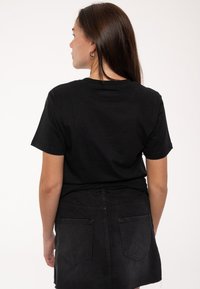 Paradiso Clothing THE ROLLING STONES SWIRL - Print T-shirt - black