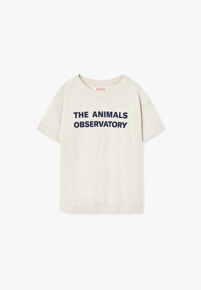 Kortärmad, ljusbeige bomulls-t-shirt med fet marinblå text: "THE ANIMALS OBSERVATORY", med rund halsringning och avslappnad passform.
