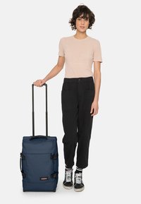 Eastpak TRANVERZ S x WHERE'S WALLY - Wheeled suitcase - frozen navy